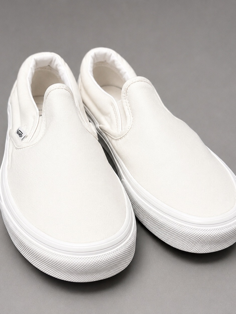 Vans Off-White Slip-On Canvas Sneakers
